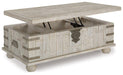 Carynhurst Coffee Table with Lift Top - Premium Cocktail Table Lift from Ashley Furniture - Just $570.44! Shop now at Furniture Wholesale Plus  We are the best furniture store in Nashville, Hendersonville, Goodlettsville, Madison, Antioch, Mount Juliet, Lebanon, Gallatin, Springfield, Murfreesboro, Franklin, Brentwood