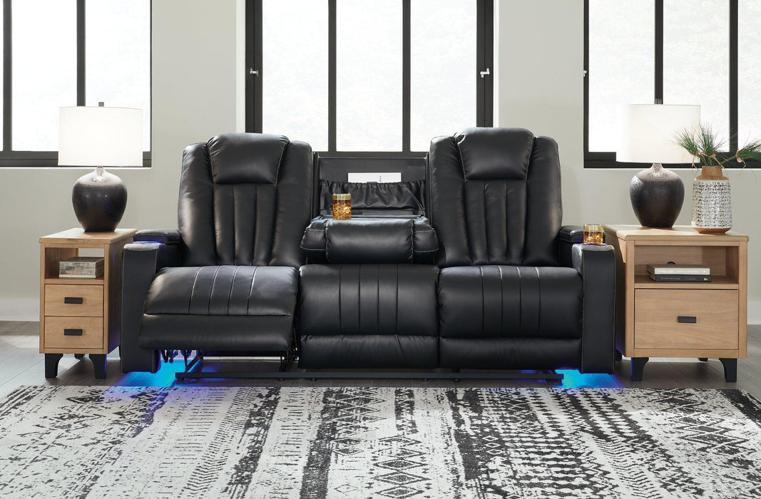 Center Point Reclining Sofa with Drop Down Table - Premium Sofa from Ashley Furniture - Just $1037.71! Shop now at Furniture Wholesale Plus  We are the best furniture store in Nashville, Hendersonville, Goodlettsville, Madison, Antioch, Mount Juliet, Lebanon, Gallatin, Springfield, Murfreesboro, Franklin, Brentwood