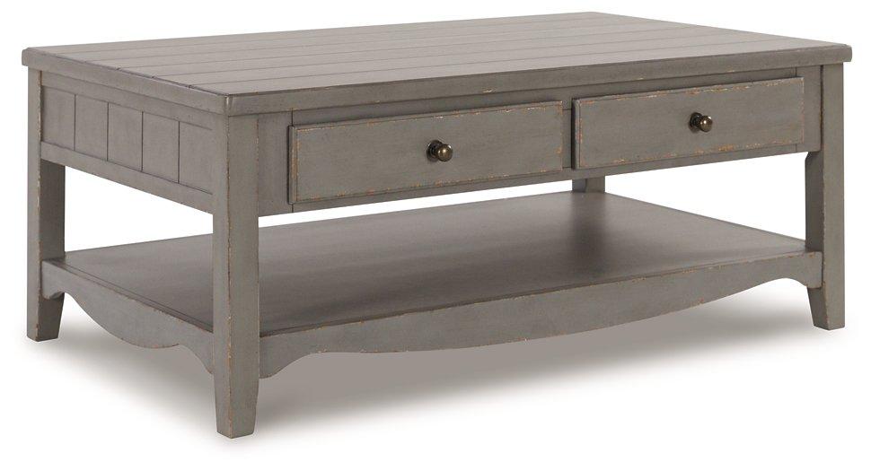 Charina Coffee Table - Premium Cocktail Table from Ashley Furniture - Just $280.92! Shop now at Furniture Wholesale Plus  We are the best furniture store in Nashville, Hendersonville, Goodlettsville, Madison, Antioch, Mount Juliet, Lebanon, Gallatin, Springfield, Murfreesboro, Franklin, Brentwood