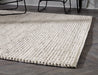 Jossick 7'8" x 10' Rug - Premium Rug from Ashley Furniture - Just $521.63! Shop now at Furniture Wholesale Plus  We are the best furniture store in Nashville, Hendersonville, Goodlettsville, Madison, Antioch, Mount Juliet, Lebanon, Gallatin, Springfield, Murfreesboro, Franklin, Brentwood