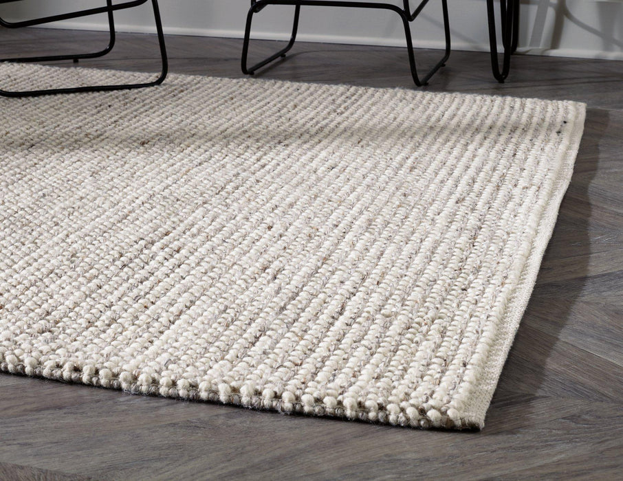 Jossick 5' x 7' Rug - Premium Rug from Ashley Furniture - Just $265.14! Shop now at Furniture Wholesale Plus  We are the best furniture store in Nashville, Hendersonville, Goodlettsville, Madison, Antioch, Mount Juliet, Lebanon, Gallatin, Springfield, Murfreesboro, Franklin, Brentwood