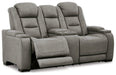 The Man-Den Power Reclining Loveseat with Console - Premium Loveseat from Ashley Furniture - Just $2152.97! Shop now at Furniture Wholesale Plus  We are the best furniture store in Nashville, Hendersonville, Goodlettsville, Madison, Antioch, Mount Juliet, Lebanon, Gallatin, Springfield, Murfreesboro, Franklin, Brentwood