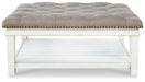 Kanwyn Upholstered Ottoman Coffee Table - Premium Cocktail Table from Ashley Furniture - Just $408.03! Shop now at Furniture Wholesale Plus  We are the best furniture store in Nashville, Hendersonville, Goodlettsville, Madison, Antioch, Mount Juliet, Lebanon, Gallatin, Springfield, Murfreesboro, Franklin, Brentwood