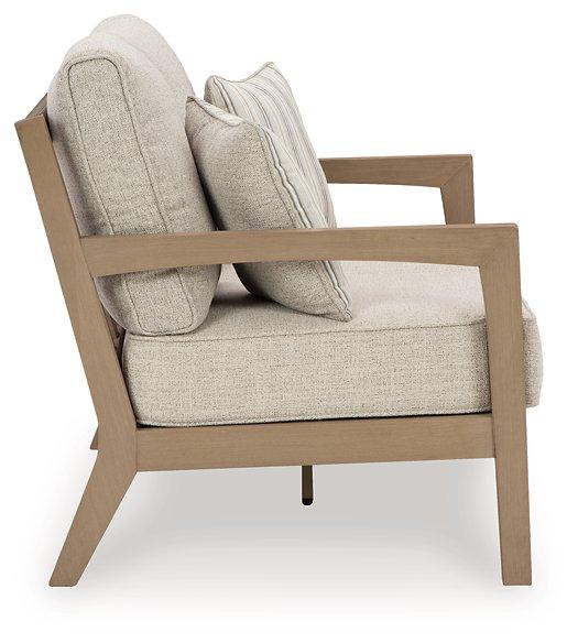 Hallow Creek Outdoor Loveseat with Cushion - Premium Outdoor Seating from Ashley Furniture - Just $1243.79! Shop now at Furniture Wholesale Plus  We are the best furniture store in Nashville, Hendersonville, Goodlettsville, Madison, Antioch, Mount Juliet, Lebanon, Gallatin, Springfield, Murfreesboro, Franklin, Brentwood