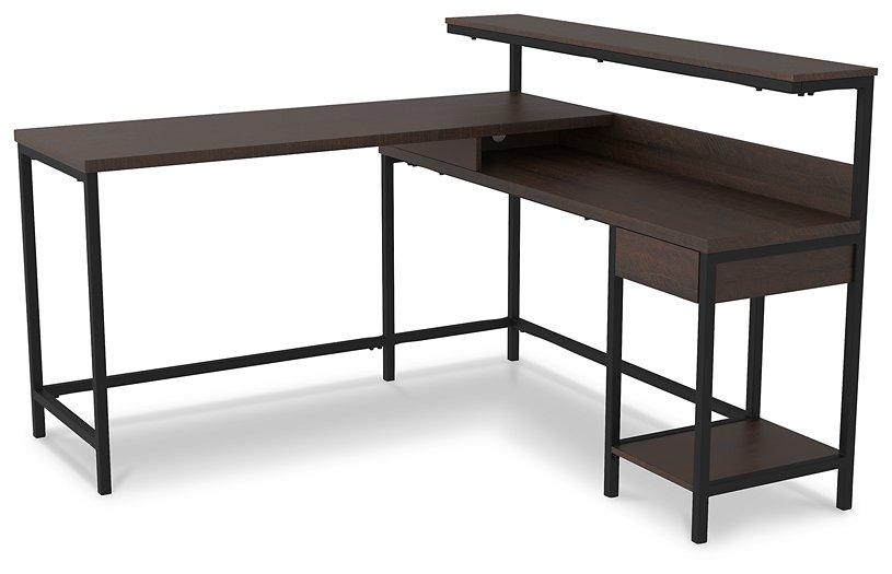 Camiburg Home Office L-Desk with Storage - Premium Desk from Ashley Furniture - Just $317.24! Shop now at Furniture Wholesale Plus  We are the best furniture store in Nashville, Hendersonville, Goodlettsville, Madison, Antioch, Mount Juliet, Lebanon, Gallatin, Springfield, Murfreesboro, Franklin, Brentwood