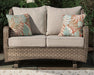 Clear Ridge Glider Loveseat with Cushion - Premium Outdoor Seating from Ashley Furniture - Just $652.38! Shop now at Furniture Wholesale Plus  We are the best furniture store in Nashville, Hendersonville, Goodlettsville, Madison, Antioch, Mount Juliet, Lebanon, Gallatin, Springfield, Murfreesboro, Franklin, Brentwood