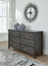 Montillan Dresser - Premium Dresser from Ashley Furniture - Just $641.55! Shop now at Furniture Wholesale Plus  We are the best furniture store in Nashville, Hendersonville, Goodlettsville, Madison, Antioch, Mount Juliet, Lebanon, Gallatin, Springfield, Murfreesboro, Franklin, Brentwood