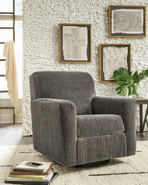 Herstow Swivel Glider Accent Chair - Premium Accent Chair from Ashley Furniture - Just $420.31! Shop now at Furniture Wholesale Plus  We are the best furniture store in Nashville, Hendersonville, Goodlettsville, Madison, Antioch, Mount Juliet, Lebanon, Gallatin, Springfield, Murfreesboro, Franklin, Brentwood