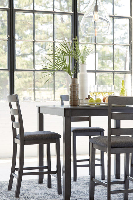 Bridson Counter Height Dining Table and Bar Stools (Set of 5) - Premium Counter Height Table from Ashley Furniture - Just $456.53! Shop now at Furniture Wholesale Plus  We are the best furniture store in Nashville, Hendersonville, Goodlettsville, Madison, Antioch, Mount Juliet, Lebanon, Gallatin, Springfield, Murfreesboro, Franklin, Brentwood