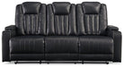 Center Point Reclining Sofa with Drop Down Table - Premium Sofa from Ashley Furniture - Just $1037.71! Shop now at Furniture Wholesale Plus  We are the best furniture store in Nashville, Hendersonville, Goodlettsville, Madison, Antioch, Mount Juliet, Lebanon, Gallatin, Springfield, Murfreesboro, Franklin, Brentwood