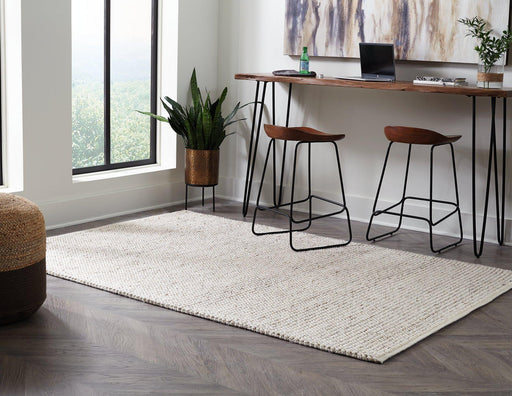 Jossick 7'8" x 10' Rug - Premium Rug from Ashley Furniture - Just $521.63! Shop now at Furniture Wholesale Plus  We are the best furniture store in Nashville, Hendersonville, Goodlettsville, Madison, Antioch, Mount Juliet, Lebanon, Gallatin, Springfield, Murfreesboro, Franklin, Brentwood