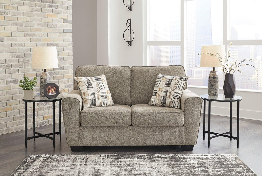 McCluer Loveseat - Premium Loveseat from Ashley Furniture - Just $529.91! Shop now at Furniture Wholesale Plus  We are the best furniture store in Nashville, Hendersonville, Goodlettsville, Madison, Antioch, Mount Juliet, Lebanon, Gallatin, Springfield, Murfreesboro, Franklin, Brentwood