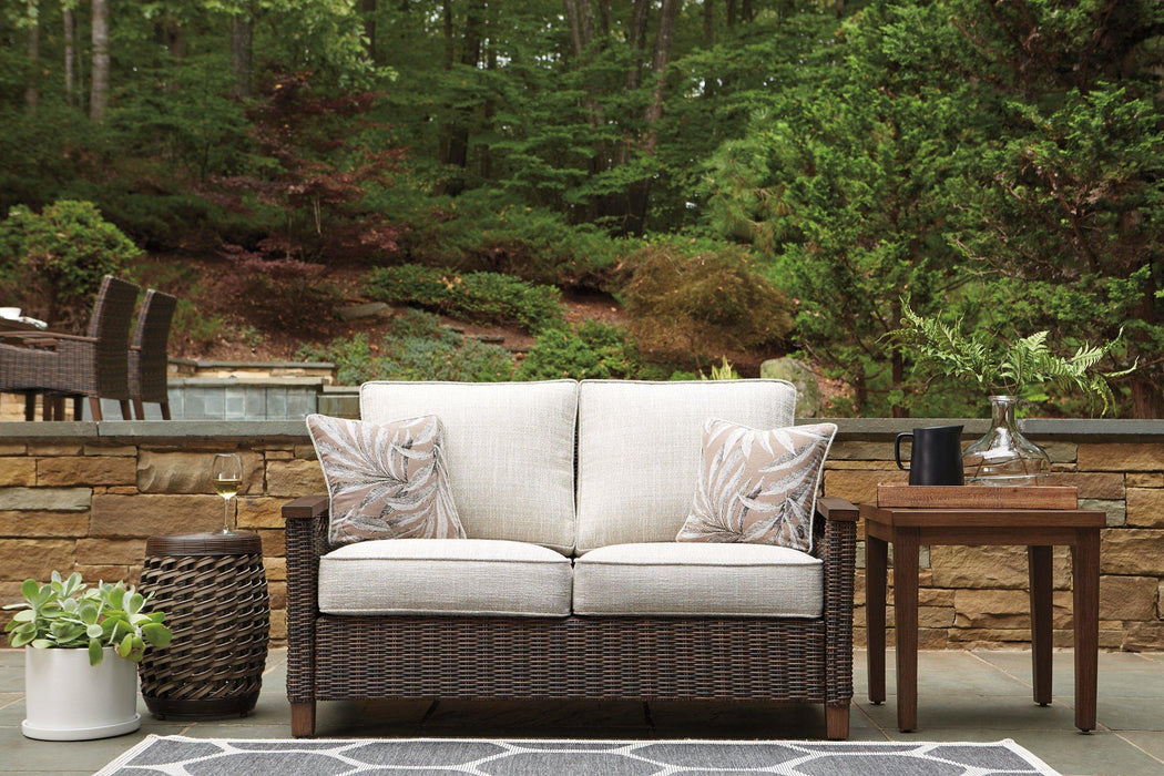 Paradise Trail Loveseat with Cushion - Premium Outdoor Seating from Ashley Furniture - Just $1007.22! Shop now at Furniture Wholesale Plus  We are the best furniture store in Nashville, Hendersonville, Goodlettsville, Madison, Antioch, Mount Juliet, Lebanon, Gallatin, Springfield, Murfreesboro, Franklin, Brentwood