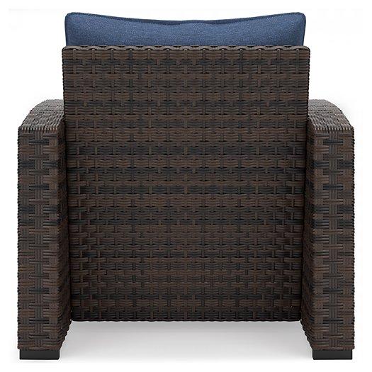 Windglow Outdoor Lounge Chair with Cushion - Premium Outdoor Seating from Ashley Furniture - Just $321.78! Shop now at Furniture Wholesale Plus  We are the best furniture store in Nashville, Hendersonville, Goodlettsville, Madison, Antioch, Mount Juliet, Lebanon, Gallatin, Springfield, Murfreesboro, Franklin, Brentwood