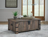 Hollum Lift-Top Coffee Table - Premium Cocktail Table Lift from Ashley Furniture - Just $403.62! Shop now at Furniture Wholesale Plus  We are the best furniture store in Nashville, Hendersonville, Goodlettsville, Madison, Antioch, Mount Juliet, Lebanon, Gallatin, Springfield, Murfreesboro, Franklin, Brentwood