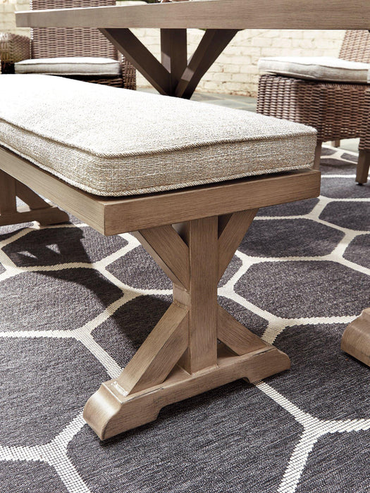 Beachcroft Bench with Cushion - Premium Outdoor Dining Bench from Ashley Furniture - Just $497.02! Shop now at Furniture Wholesale Plus  We are the best furniture store in Nashville, Hendersonville, Goodlettsville, Madison, Antioch, Mount Juliet, Lebanon, Gallatin, Springfield, Murfreesboro, Franklin, Brentwood