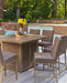 Walton Bridge Outdoor Bar Table with Fire Pit - Premium Outdoor Pub Table w/FP from Ashley Furniture - Just $1486.56! Shop now at Furniture Wholesale Plus  We are the best furniture store in Nashville, Hendersonville, Goodlettsville, Madison, Antioch, Mount Juliet, Lebanon, Gallatin, Springfield, Murfreesboro, Franklin, Brentwood