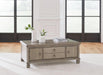 Lexorne Coffee Table - Premium Cocktail Table from Ashley Furniture - Just $495.42! Shop now at Furniture Wholesale Plus  We are the best furniture store in Nashville, Hendersonville, Goodlettsville, Madison, Antioch, Mount Juliet, Lebanon, Gallatin, Springfield, Murfreesboro, Franklin, Brentwood