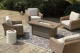 Beachcroft Beachcroft Fire Pit Table with Four Nuvella Swivel Lounge Chairs - Premium Outdoor Seating Set from Ashley Furniture - Just $4022.76! Shop now at Furniture Wholesale Plus  We are the best furniture store in Nashville, Hendersonville, Goodlettsville, Madison, Antioch, Mount Juliet, Lebanon, Gallatin, Springfield, Murfreesboro, Franklin, Brentwood