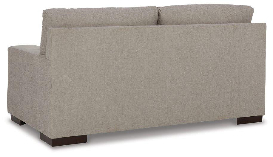 Maggie Loveseat - Premium Loveseat from Ashley Furniture - Just $660.55! Shop now at Furniture Wholesale Plus  We are the best furniture store in Nashville, Hendersonville, Goodlettsville, Madison, Antioch, Mount Juliet, Lebanon, Gallatin, Springfield, Murfreesboro, Franklin, Brentwood