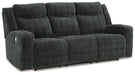 Martinglenn Power Reclining Sofa with Drop Down Table - Premium Sofa from Ashley Furniture - Just $1182.47! Shop now at Furniture Wholesale Plus  We are the best furniture store in Nashville, Hendersonville, Goodlettsville, Madison, Antioch, Mount Juliet, Lebanon, Gallatin, Springfield, Murfreesboro, Franklin, Brentwood