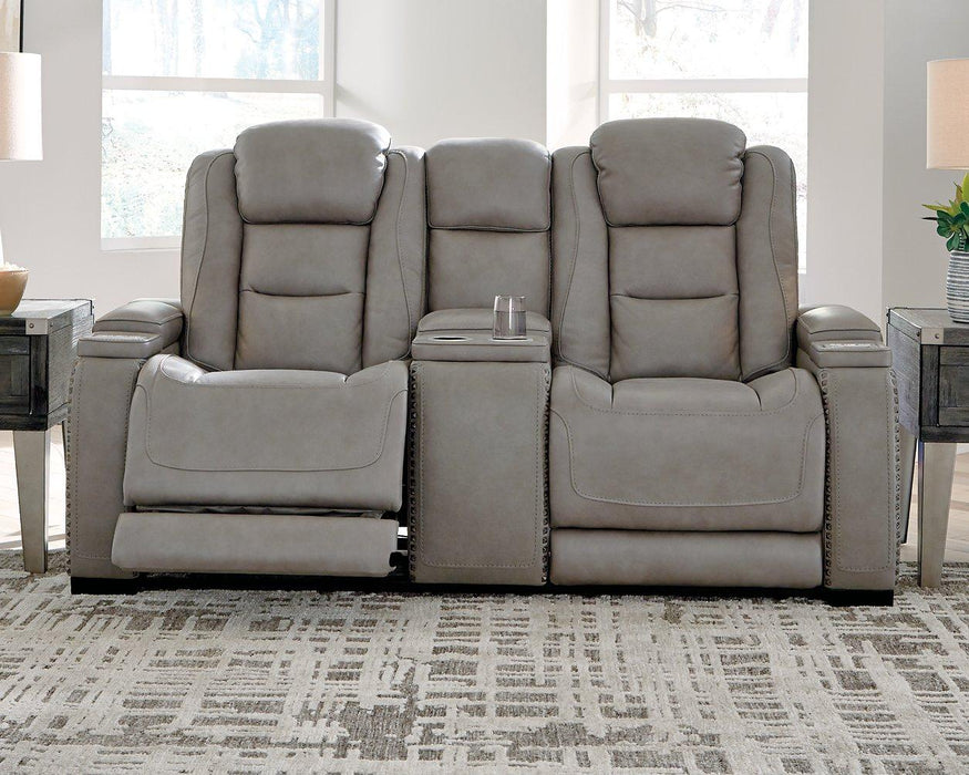 The Man-Den Power Reclining Loveseat with Console - Premium Loveseat from Ashley Furniture - Just $2152.97! Shop now at Furniture Wholesale Plus  We are the best furniture store in Nashville, Hendersonville, Goodlettsville, Madison, Antioch, Mount Juliet, Lebanon, Gallatin, Springfield, Murfreesboro, Franklin, Brentwood