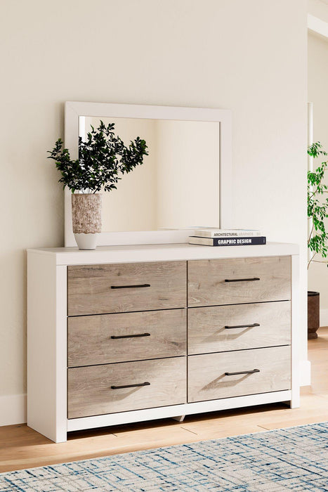 Charbitt Dresser and Mirror - Premium Dresser & Mirror from Ashley Furniture - Just $408.26! Shop now at Furniture Wholesale Plus  We are the best furniture store in Nashville, Hendersonville, Goodlettsville, Madison, Antioch, Mount Juliet, Lebanon, Gallatin, Springfield, Murfreesboro, Franklin, Brentwood