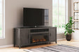 Montillan 84" TV Stand with Electric Fireplace - Premium TV Stand from Ashley Furniture - Just $1160.41! Shop now at Furniture Wholesale Plus  We are the best furniture store in Nashville, Hendersonville, Goodlettsville, Madison, Antioch, Mount Juliet, Lebanon, Gallatin, Springfield, Murfreesboro, Franklin, Brentwood