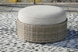 Calworth Outdoor Ottoman with Cushion - Premium Outdoor Ottoman from Ashley Furniture - Just $249.39! Shop now at Furniture Wholesale Plus  We are the best furniture store in Nashville, Hendersonville, Goodlettsville, Madison, Antioch, Mount Juliet, Lebanon, Gallatin, Springfield, Murfreesboro, Franklin, Brentwood