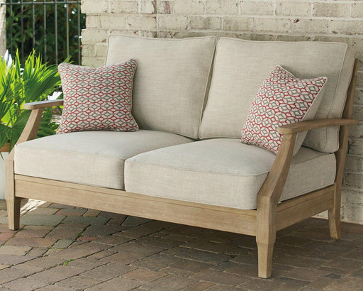 Clare View Loveseat with Cushion - Premium Outdoor Seating from Ashley Furniture - Just $698.28! Shop now at Furniture Wholesale Plus  We are the best furniture store in Nashville, Hendersonville, Goodlettsville, Madison, Antioch, Mount Juliet, Lebanon, Gallatin, Springfield, Murfreesboro, Franklin, Brentwood