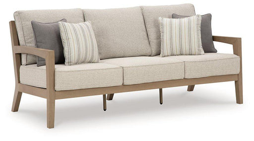 Hallow Creek Outdoor Sofa with Cushion - Premium Outdoor Seating from Ashley Furniture - Just $1637.95! Shop now at Furniture Wholesale Plus  We are the best furniture store in Nashville, Hendersonville, Goodlettsville, Madison, Antioch, Mount Juliet, Lebanon, Gallatin, Springfield, Murfreesboro, Franklin, Brentwood