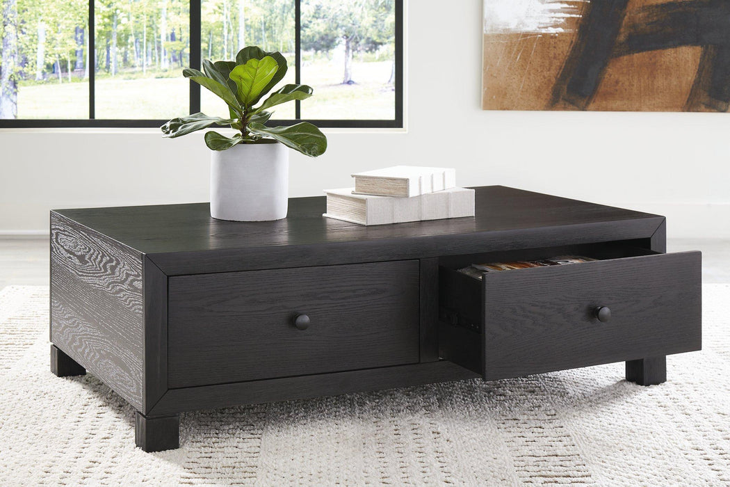 Foyland Coffee Table - Premium Cocktail Table from Ashley Furniture - Just $480.41! Shop now at Furniture Wholesale Plus  We are the best furniture store in Nashville, Hendersonville, Goodlettsville, Madison, Antioch, Mount Juliet, Lebanon, Gallatin, Springfield, Murfreesboro, Franklin, Brentwood