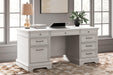 Kanwyn Home Office Desk - Premium Desk from Ashley Furniture - Just $394.18! Shop now at Furniture Wholesale Plus  We are the best furniture store in Nashville, Hendersonville, Goodlettsville, Madison, Antioch, Mount Juliet, Lebanon, Gallatin, Springfield, Murfreesboro, Franklin, Brentwood