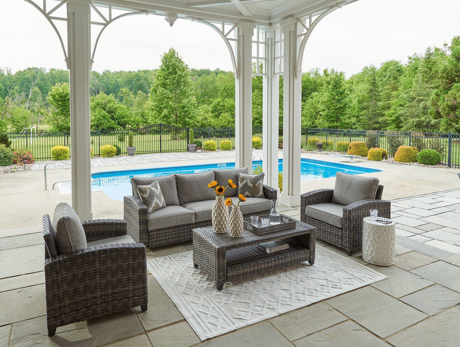 Oasis Court Outdoor Sofa/Chairs/Table Set (Set of 4) - Premium Outdoor Seating Set from Ashley Furniture - Just $1517.08! Shop now at Furniture Wholesale Plus  We are the best furniture store in Nashville, Hendersonville, Goodlettsville, Madison, Antioch, Mount Juliet, Lebanon, Gallatin, Springfield, Murfreesboro, Franklin, Brentwood