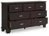 Covetown Dresser - Premium Dresser from Ashley Furniture - Just $394.18! Shop now at Furniture Wholesale Plus  We are the best furniture store in Nashville, Hendersonville, Goodlettsville, Madison, Antioch, Mount Juliet, Lebanon, Gallatin, Springfield, Murfreesboro, Franklin, Brentwood