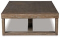 Cariton Coffee Table - Premium Cocktail Table from Ashley Furniture - Just $261.50! Shop now at Furniture Wholesale Plus  We are the best furniture store in Nashville, Hendersonville, Goodlettsville, Madison, Antioch, Mount Juliet, Lebanon, Gallatin, Springfield, Murfreesboro, Franklin, Brentwood