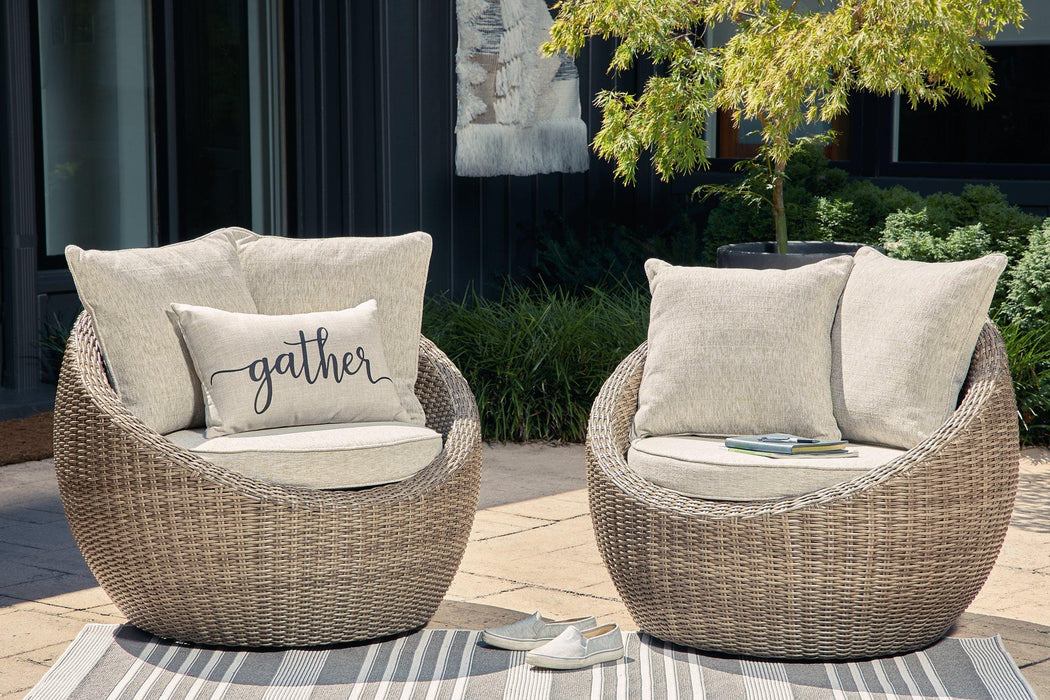 Danson Swivel Lounge with Cushion (Set of 2) - Premium Outdoor Seating from Ashley Furniture - Just $1243.79! Shop now at Furniture Wholesale Plus  We are the best furniture store in Nashville, Hendersonville, Goodlettsville, Madison, Antioch, Mount Juliet, Lebanon, Gallatin, Springfield, Murfreesboro, Franklin, Brentwood