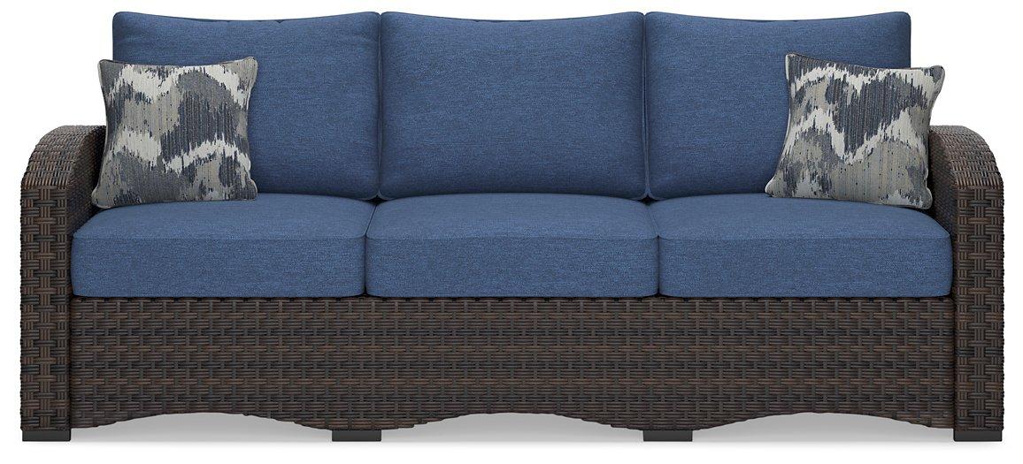 Windglow Outdoor Sofa with Cushion - Premium Outdoor Seating from Ashley Furniture - Just $801.15! Shop now at Furniture Wholesale Plus  We are the best furniture store in Nashville, Hendersonville, Goodlettsville, Madison, Antioch, Mount Juliet, Lebanon, Gallatin, Springfield, Murfreesboro, Franklin, Brentwood