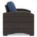 Windglow Outdoor Lounge Chair with Cushion - Premium Outdoor Seating from Ashley Furniture - Just $321.78! Shop now at Furniture Wholesale Plus  We are the best furniture store in Nashville, Hendersonville, Goodlettsville, Madison, Antioch, Mount Juliet, Lebanon, Gallatin, Springfield, Murfreesboro, Franklin, Brentwood