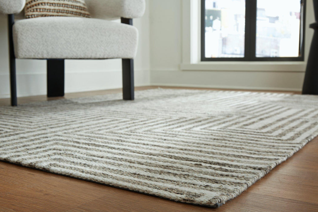 Jossen Rug - Premium Rug Medium from Ashley Furniture - Just $175.10! Shop now at Furniture Wholesale Plus  We are the best furniture store in Nashville, Hendersonville, Goodlettsville, Madison, Antioch, Mount Juliet, Lebanon, Gallatin, Springfield, Murfreesboro, Franklin, Brentwood