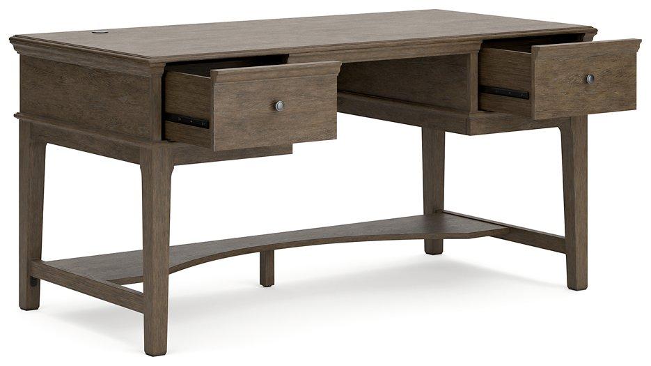 Janismore Home Office Storage Leg Desk - Premium Desk from Ashley Furniture - Just $579.20! Shop now at Furniture Wholesale Plus  We are the best furniture store in Nashville, Hendersonville, Goodlettsville, Madison, Antioch, Mount Juliet, Lebanon, Gallatin, Springfield, Murfreesboro, Franklin, Brentwood