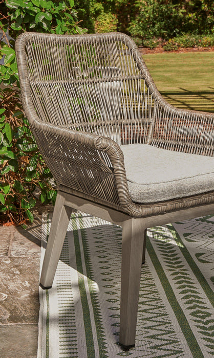 Beach Front Arm Chair with Cushion (Set of 2) - Premium Outdoor Dining Chair from Ashley Furniture - Just $611.37! Shop now at Furniture Wholesale Plus  We are the best furniture store in Nashville, Hendersonville, Goodlettsville, Madison, Antioch, Mount Juliet, Lebanon, Gallatin, Springfield, Murfreesboro, Franklin, Brentwood