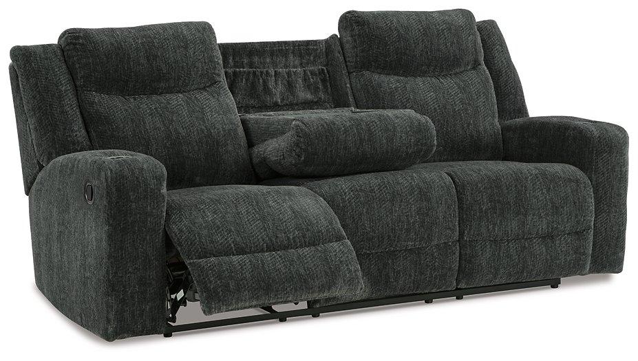 Martinglenn Reclining Sofa with Drop Down Table - Premium Sofa from Ashley Furniture - Just $1000.64! Shop now at Furniture Wholesale Plus  We are the best furniture store in Nashville, Hendersonville, Goodlettsville, Madison, Antioch, Mount Juliet, Lebanon, Gallatin, Springfield, Murfreesboro, Franklin, Brentwood