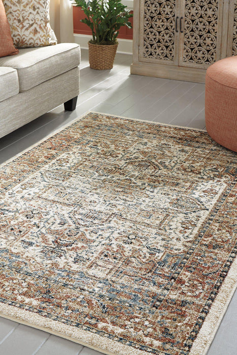 Jirair 7'10" x 10' Rug - Premium Rug from Ashley Furniture - Just $445.72! Shop now at Furniture Wholesale Plus  We are the best furniture store in Nashville, Hendersonville, Goodlettsville, Madison, Antioch, Mount Juliet, Lebanon, Gallatin, Springfield, Murfreesboro, Franklin, Brentwood