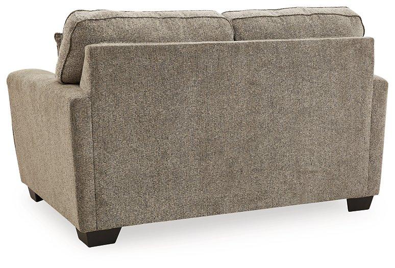 McCluer Loveseat - Premium Loveseat from Ashley Furniture - Just $529.91! Shop now at Furniture Wholesale Plus  We are the best furniture store in Nashville, Hendersonville, Goodlettsville, Madison, Antioch, Mount Juliet, Lebanon, Gallatin, Springfield, Murfreesboro, Franklin, Brentwood