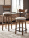 Valebeck Bar Height Bar Stool - Premium Barstool from Ashley Furniture - Just $176.98! Shop now at Furniture Wholesale Plus  We are the best furniture store in Nashville, Hendersonville, Goodlettsville, Madison, Antioch, Mount Juliet, Lebanon, Gallatin, Springfield, Murfreesboro, Franklin, Brentwood