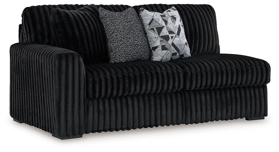 Midnight-Madness Sectional Sofa with Chaise - Premium Chofa from Ashley Furniture - Just $1188.84! Shop now at Furniture Wholesale Plus  We are the best furniture store in Nashville, Hendersonville, Goodlettsville, Madison, Antioch, Mount Juliet, Lebanon, Gallatin, Springfield, Murfreesboro, Franklin, Brentwood