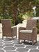 Beachcroft Arm Chair with Cushion (Set of 2) - Premium Outdoor Dining Chair from Ashley Furniture - Just $770.66! Shop now at Furniture Wholesale Plus  We are the best furniture store in Nashville, Hendersonville, Goodlettsville, Madison, Antioch, Mount Juliet, Lebanon, Gallatin, Springfield, Murfreesboro, Franklin, Brentwood