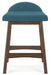 Lyncott Counter Height Bar Stool - Premium Barstool from Ashley Furniture - Just $92.51! Shop now at Furniture Wholesale Plus  We are the best furniture store in Nashville, Hendersonville, Goodlettsville, Madison, Antioch, Mount Juliet, Lebanon, Gallatin, Springfield, Murfreesboro, Franklin, Brentwood