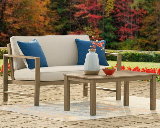 Fynnegan Outdoor Loveseat with Table (Set of 2) - Premium Outdoor Seating Set from Ashley Furniture - Just $442.30! Shop now at Furniture Wholesale Plus  We are the best furniture store in Nashville, Hendersonville, Goodlettsville, Madison, Antioch, Mount Juliet, Lebanon, Gallatin, Springfield, Murfreesboro, Franklin, Brentwood